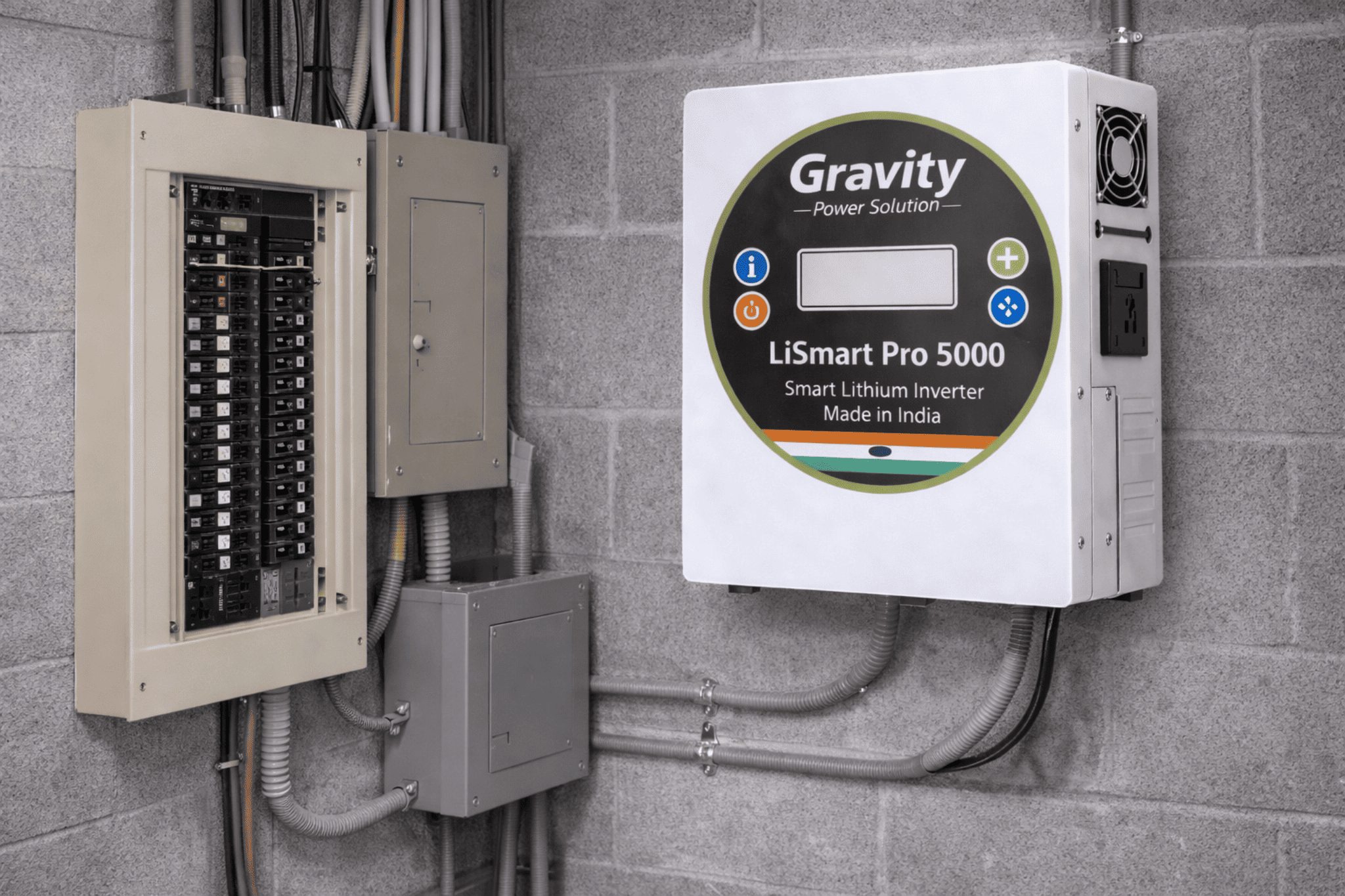 LiSmart Pro 5000 smart lithium inverter installed in electrical utility room with distribution panel by Gravity Power Solution